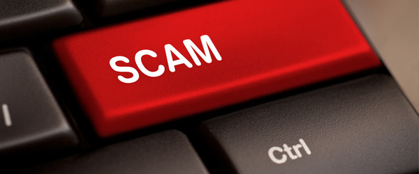 bigstock-Scam-Computer-Key-43681090