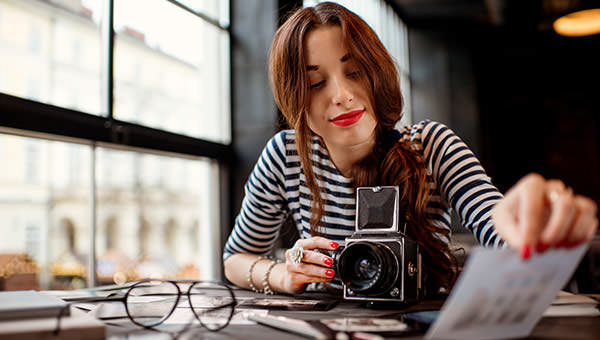 bigstock-Photographer-working-78870623