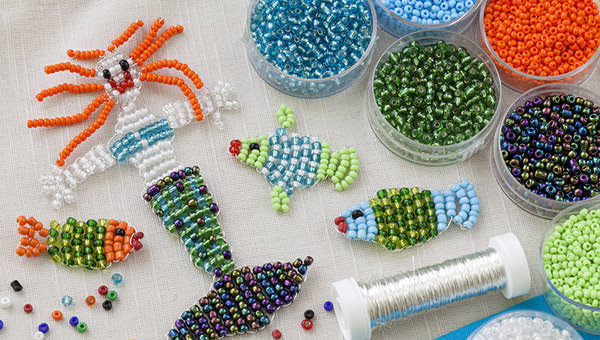 Beaded fishes and mermaid and colorful beads