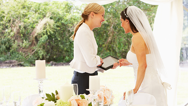 Bride With Wedding Planner In Marquee