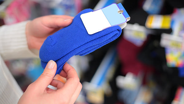 In Shop Hands Hold Socks