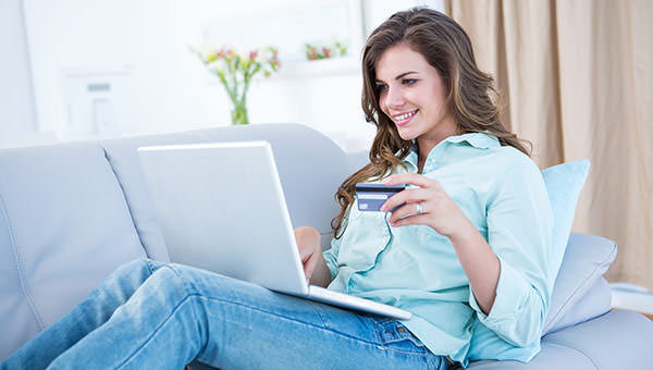 bigstock-Pretty-woman-doing-online-shop-89050895