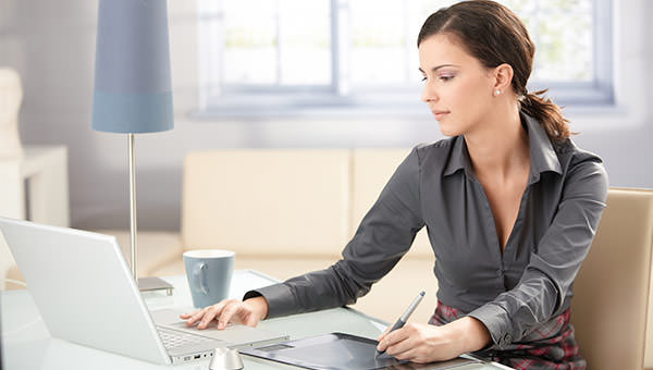 bigstock-Young-graphic-designer-working-18030890