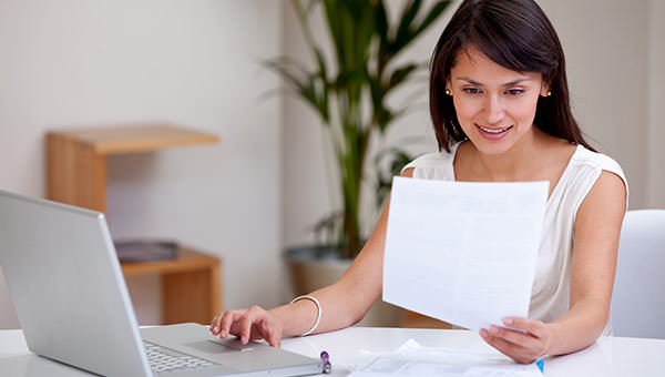 bigstock-Woman-working-at-home-on-a-lap-13732448